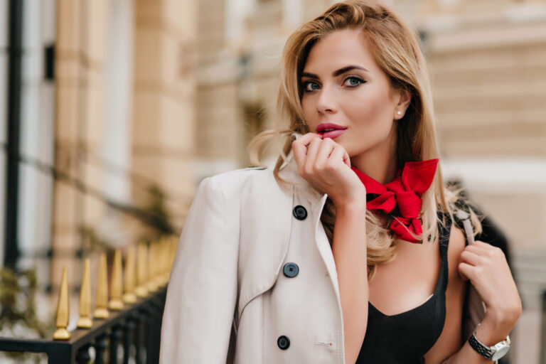 little bit surprised female model jacket posing beside home morning